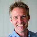 Headshot of Mark Thomson, a man with a friendly smile, representing a logistics client.