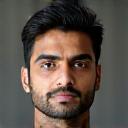 Headshot of Sanjay Kumar, a man with a thoughtful expression, an executive from a manufacturing firm.